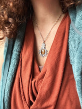 Load image into Gallery viewer, Cacoxenite and moonstone set in 22k gold medallion