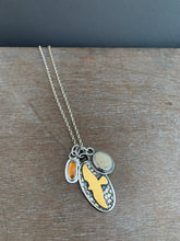 Load image into Gallery viewer, Garnet and beach stone with a gold hawk charm collection