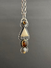 Load image into Gallery viewer, Citrine and Montana agate set in 22k gold medallion