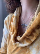 Load image into Gallery viewer, Large golden hamsa stamped bird pendant