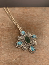 Load image into Gallery viewer, Uvarovite druzy and kyanite medallion