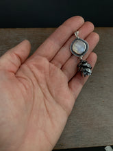 Load image into Gallery viewer, Cast cedar cone necklace with a moonstone