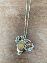 Load image into Gallery viewer, Rutilated quartz tourmaline and lion collection