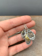 Load image into Gallery viewer, Rutilated quartz tourmaline and lion collection