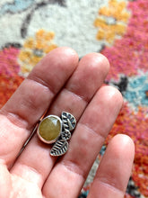 Load image into Gallery viewer, Yellow sapphire with leaf accents size 8