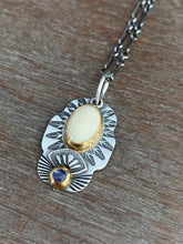 Load image into Gallery viewer, Fossilized mastodon ivory and tanzanite set in 22k gold charm necklace
