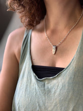 Load image into Gallery viewer, Fossilized woolly mammoth ivory charm