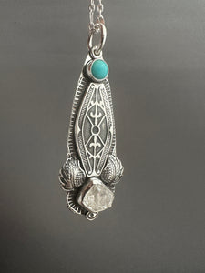 Turquoise and crystal pendant