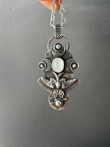 Moonstone bird medallion