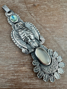 Helen the owl and a moonstone