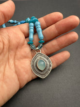Load image into Gallery viewer, Layered silver and Aquamarine eye pendant with hand knotted vintage glass beads
