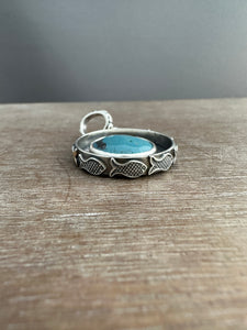 Leland blue fish parable pendant