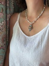 Load image into Gallery viewer, Bronze lion with aquamarine

