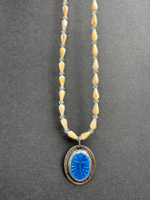 Load image into Gallery viewer, Enameled cross on a beaded mother of pearl and crystal necklace.
