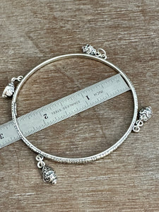 Sterling silver patterned Jingle bangle