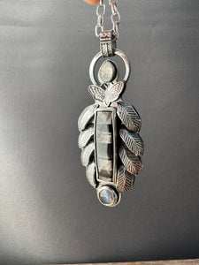 Hypersthene and feathers pendant