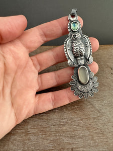 Helen the owl and a moonstone