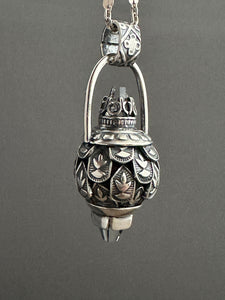 Vintage crystal dragon egg medallion