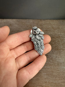 Owl Queen with a Hidden Sapphire