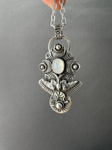 Moonstone bird medallion