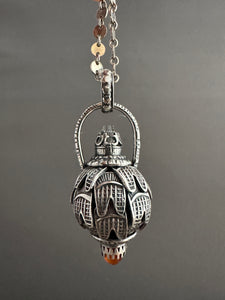 Vintage crystal and carnelian dragon egg medallion