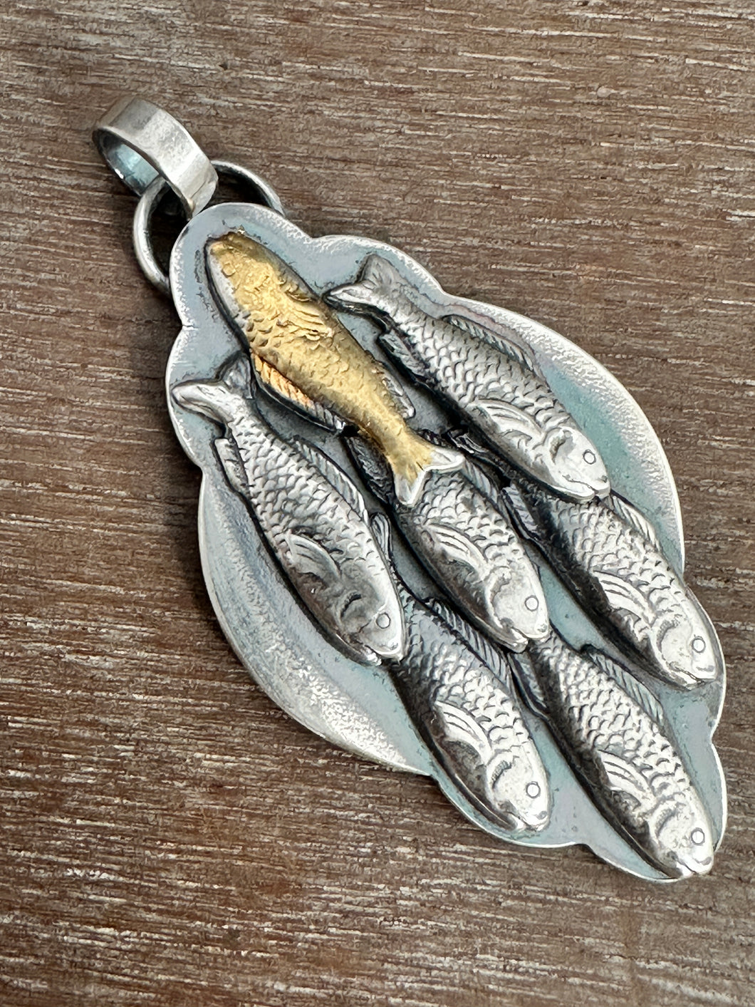 Silver fish parable pendant