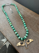 Load image into Gallery viewer, Bronze and silver stamped bird on hand knotted silk and gemstone necklace
