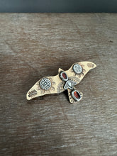 Load image into Gallery viewer, Bronze and silver stamped bird brooch with garnet
