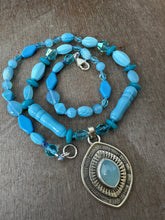 Load image into Gallery viewer, Layered silver and Aquamarine eye pendant with hand knotted vintage glass beads
