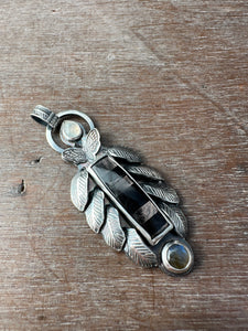 Hypersthene and feathers pendant