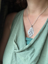 Load image into Gallery viewer, Silver fish parable pendant
