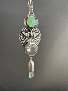 Green amethyst bird medallion