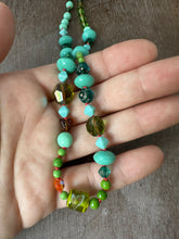 Load image into Gallery viewer, Vintage glass bead silk knotted necklace in greens and oranges
