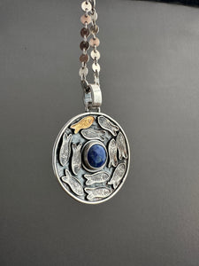 Silver fish parable pendant with lapis