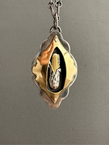Silver and brass corn pendant