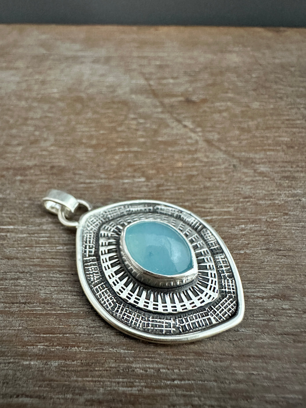 Layered silver and Aquamarine eye pendant