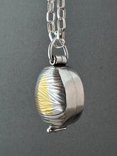 Load image into Gallery viewer, Textured oval flower locket.
