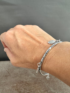 Sterling silver patterned Jingle bangle