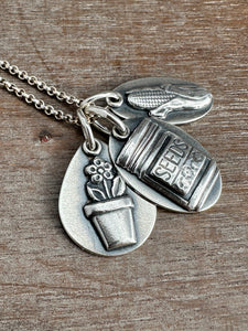 A gardeners charm set