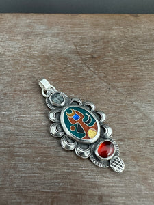 Cloisonné glass enamel pendant with trilobite fossil and garnet