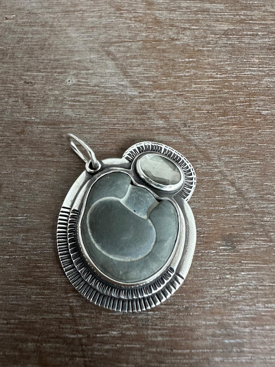 Fairy stone and grey spinel pendant