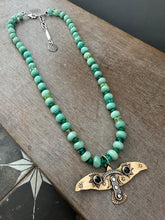 Load image into Gallery viewer, Bronze and silver stamped bird on hand knotted silk and gemstone necklace
