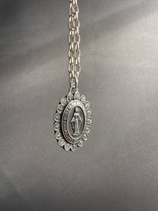 Miraculous Medal with a sacred heart on the back