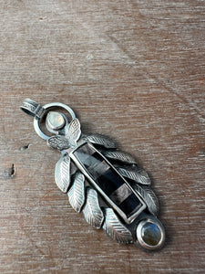 Hypersthene and feathers pendant