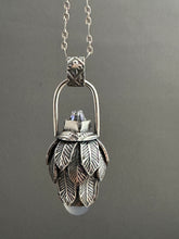 Load image into Gallery viewer, Vintage crystal and Blue Chalcedony feather dragon egg medallion
