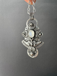 Moonstone bird medallion