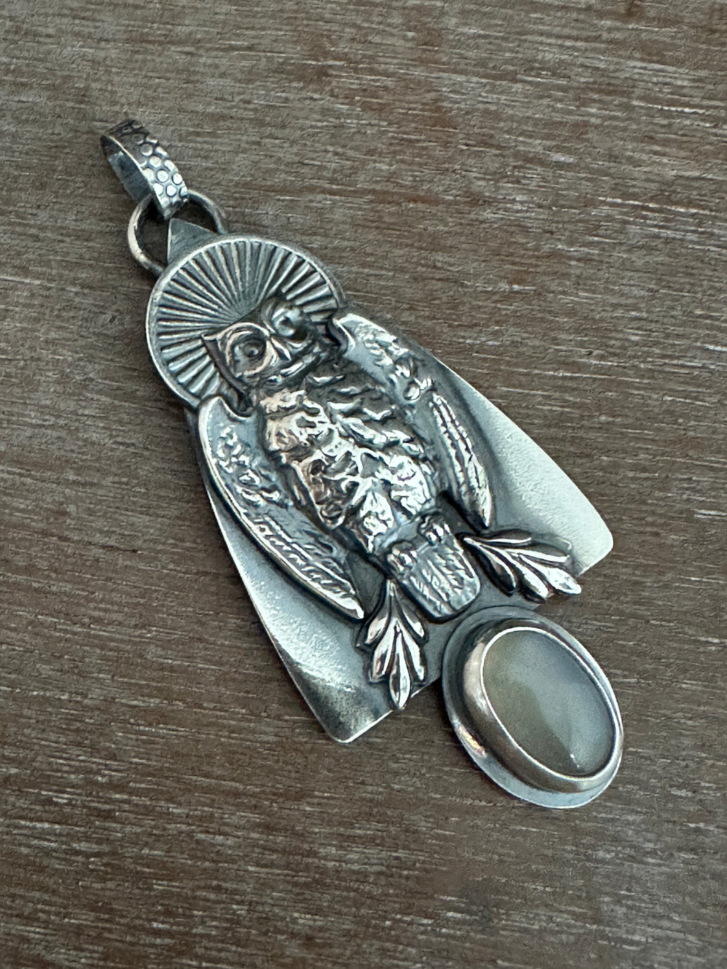 Helen the owl and a moonstone
