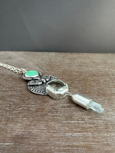 Green amethyst bird medallion