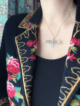 Load image into Gallery viewer, Bronze and silver stamped bird pendant with pink tourmaline
