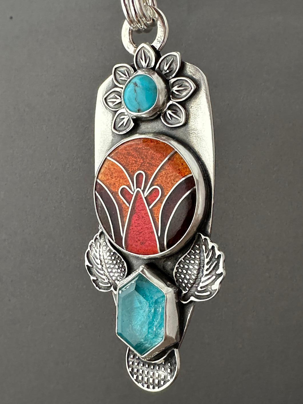 Cloisonné glass enamel with turquoise and apatite doublet.